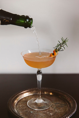 The Sunday Stroll cocktail at Elvie’s, made with vodka, orange water, rosemary syrup and lemon, finished with cava.