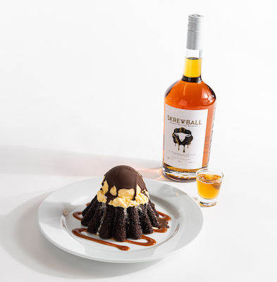 Chilis Grown Up Molten cake with a sidecar of Skrewball peanut butter whiskey