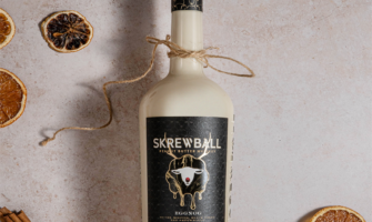 a bottle of Skrewball Peanut Butter Eggnog Whiskey