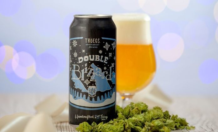 A can and glass of Tröegs Double Blizzard IPA beer