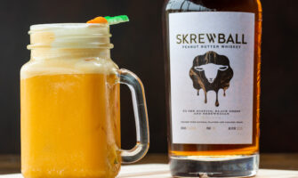 Skrewball peanut butter flavored whiskey bottle and cocktail