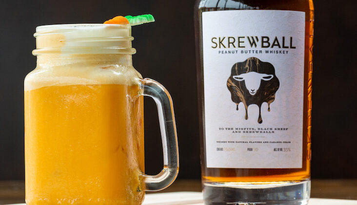 Skrewball peanut butter flavored whiskey bottle and cocktail