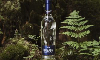 Finlandia Vodka bottle set against greenery