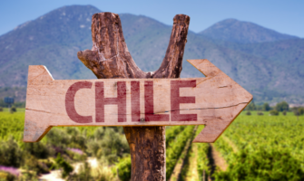 vineyard sign with arrow that says Chile