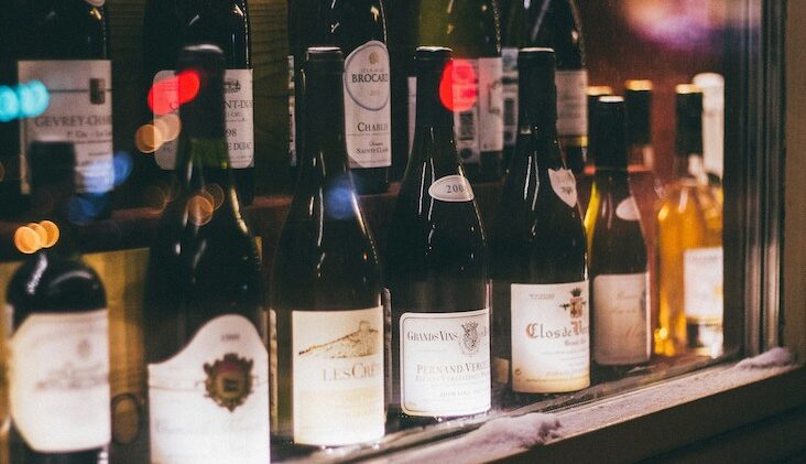 French wine bottles on shelf