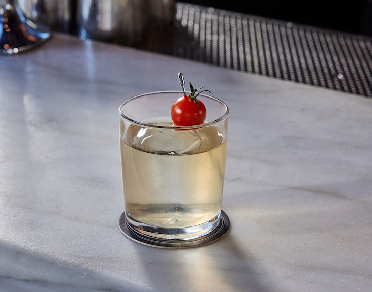 Wavelength cocktail with cherry tomato garnish