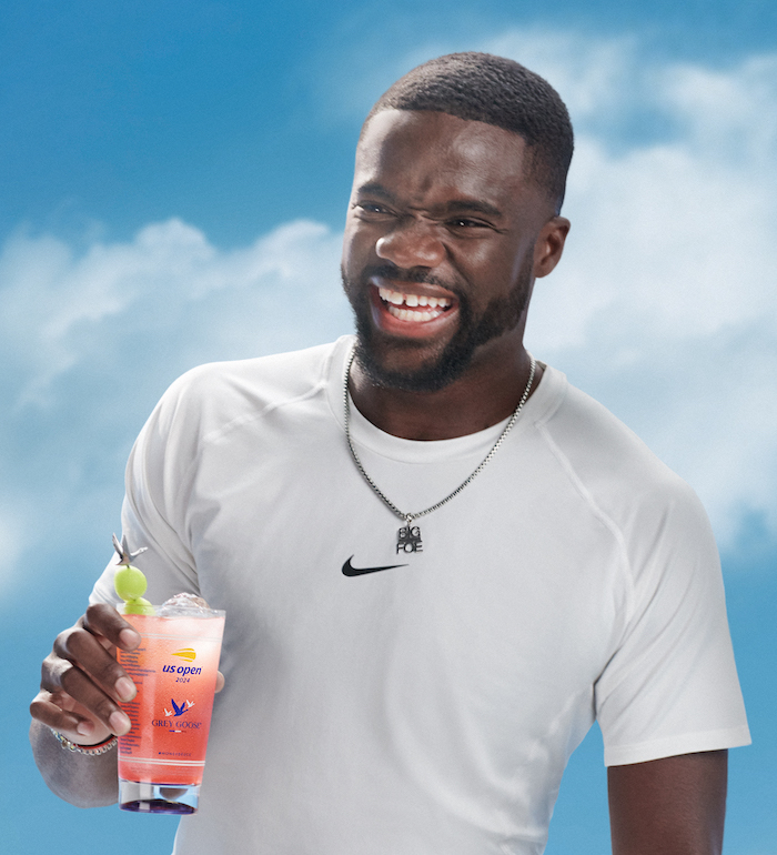 tennis star Frances Tiafoe holding Goose Honey Deuce cocktail