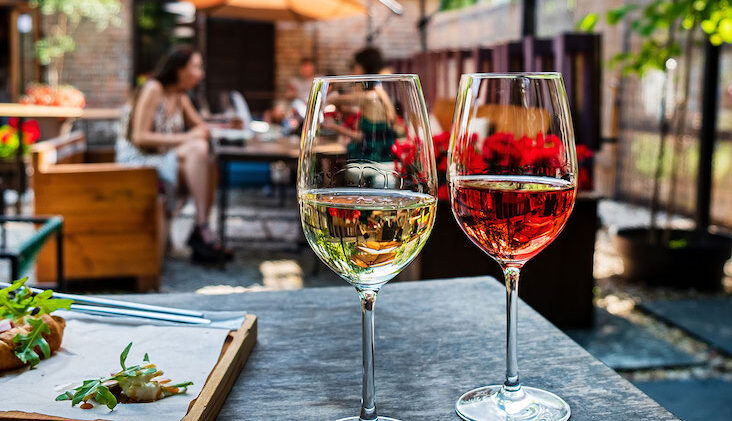 two glasses of wine on a table
